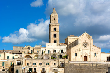 Fototapeta na wymiar Horizontal View of the City of Matera on Blue Sky Background. Matera, South Of Italy