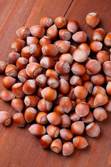 hazelnuts on a wooden table