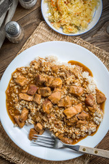Barley groats with stewed meat.
