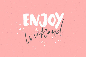 Enjoy the weekend. Inspirational caption, handwritten text on pastel pink background