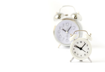 Classic bell alarm clocks on white background with copy space