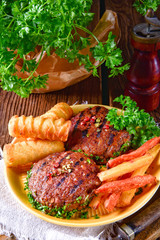 grilled bullets with croquettes and vegetables