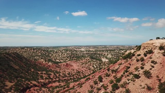 Aerial view on mountains with argan trees in their natural habitat - in Morocco, 4k