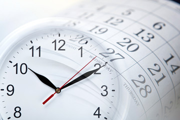 wall calendar with the number of days and clock