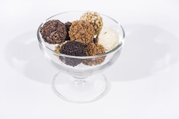 Sweet chocolate candies balls with nuts.