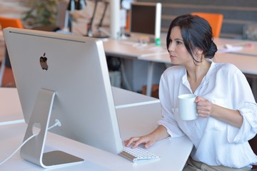 Woman working at computer in an office