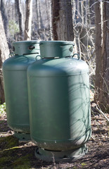 propane gas tanks for swimming pool in woods