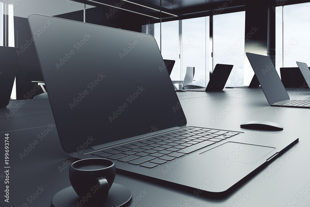 Poster Side view of empty laptop on desktop