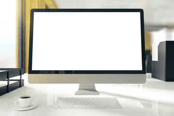 Desktop with empty white computer screen