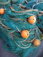 Laesoe / Denmark: A wooden pallet with fishing nets on the pier in Vesteroe Havn