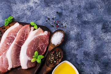 Three raw pieces of meat