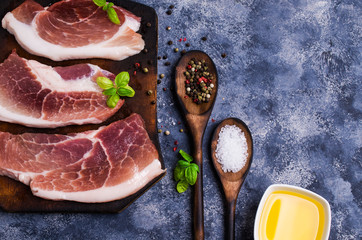 Three raw pieces of meat