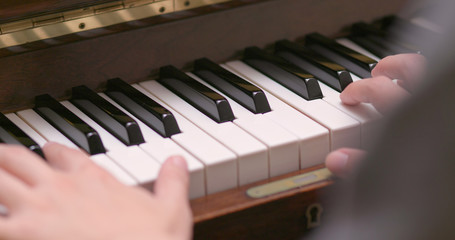 Fototapeta premium Man playing piano