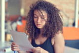 Business woman working in office with documents