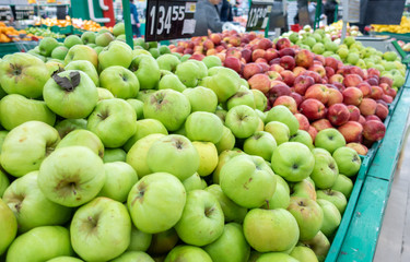 green and red apples on the farm market