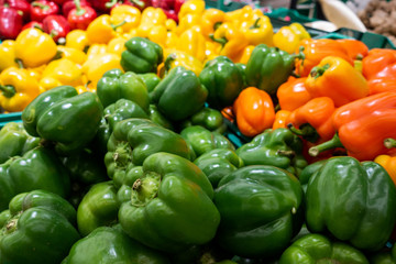 Obraz na płótnie Canvas red, yellow, green pepper on the market