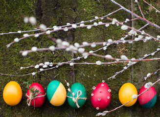 decorated Easter eggs on wooden background