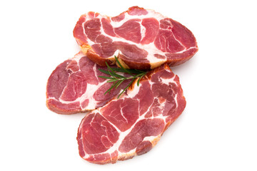 Fresh pig crude meat with rosemary.