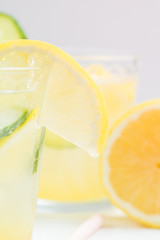 Sassy detox water with lemons, cucumbers and ginger. Healthy breakfast.