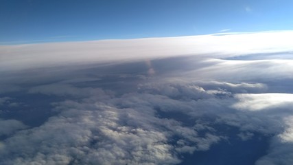 Fototapeta na wymiar Clouds view from the airplane window