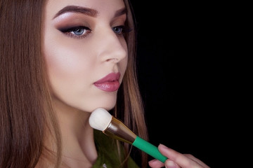Obraz premium Makeup for model make-up brush