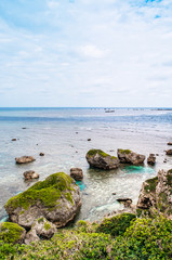Fototapeta na wymiar Rock cliff and cape of East cape Hennazaki, Miyako, Okinawa, Japan