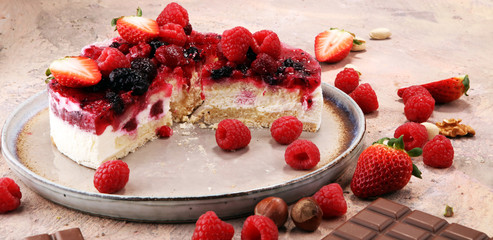 raspberry cake and many fresh raspberries