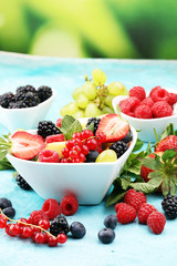 salad with fresh fruits and berries. healthy spring fruit salad