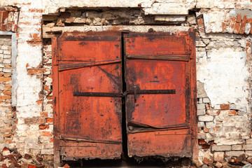Fragment of the ancient wall of the temple, gates, brickwork