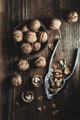Walnuts on wooden table in overhead view