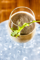 Milk shake with chocolate in glass.