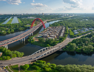 Picturesque bridge over the Moscow River, the prospectus of Marshal Zhukov and neighborhood in the summer sunny day. View from high