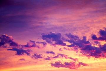 purple landscape with sky, clouds and sunrise a view