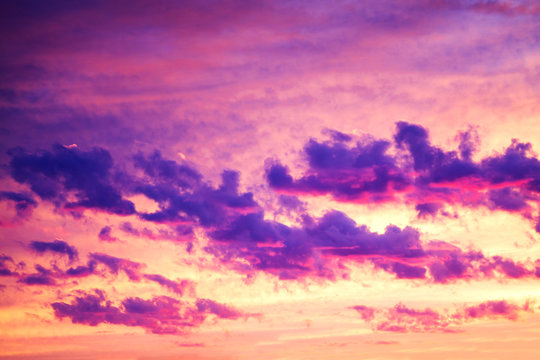 purple landscape with sky, clouds and sunrise a view © yanikap