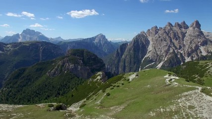 AERIAL VIEW: flight over National Park Tre Cime Di Lavaredo. Italian Dolomite