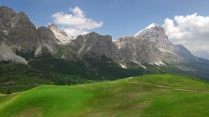 AERIAL VIEW: flight over Passo Falzarego. Italian Dolomites alps.camera moves farwards