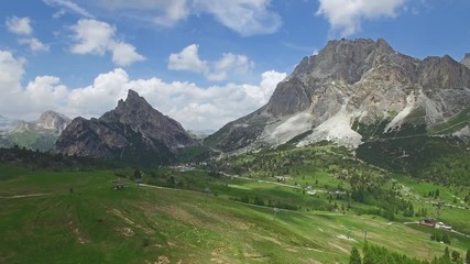 AERIAL VIEW: flight over Passo Falzarego. Italian Dolomites alps.camera moves farwards