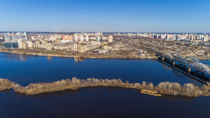 Obraz premium Aerial view of the Kiev city, Ukraine. Dnieper river with bridges. Darnitskiy bridge