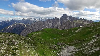 AERIAL VIEW: flight over National Park Tre Cime Di Lavaredo. Italian Dolomite