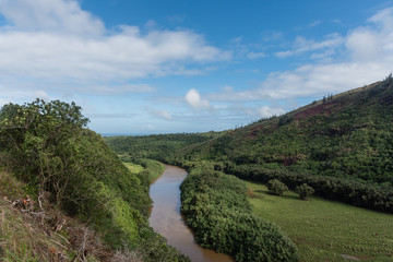 Fototapeta na wymiar Picturesque Wailua River vista after a major rainstorm on Kauai, Hawaii