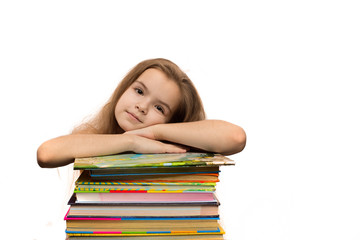 Cute caucasian little girl with books. School portrait. Isolated on white background