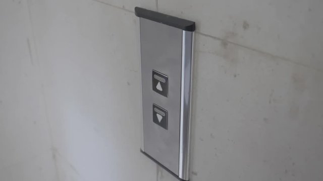 press elevator botom