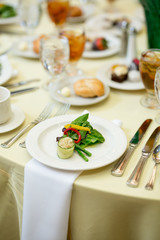 Fancy Salad on Dinner Table at Restaurant