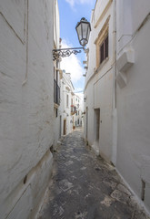 Fototapeta na wymiar Ostuni (Puglia, Italy) - The gorgeous white city in province of Brindisi, Apulia region, Southern Italy, with the old historic center on the hill and beside the sea