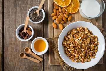home made granola on wooden surface surface