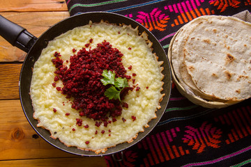 Mexican melted cheese with Chorizo