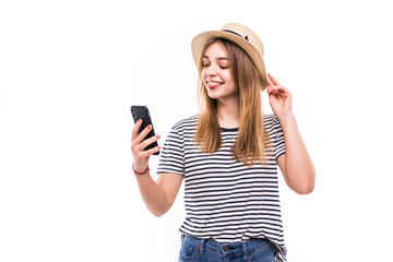Naklejka premium Beautiful young girl making video call with smartphone isolated on a white