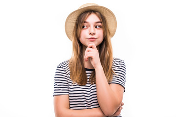 Attractive hipster fashion teen girl in hat thinking isolated on white background