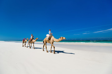 Mother and kids at tropical beach