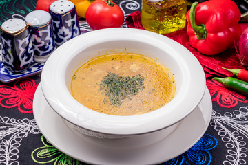 Chicken soup bouillon in a plate